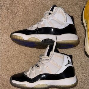 Jordan Kids Black and White High-Top Sneakers